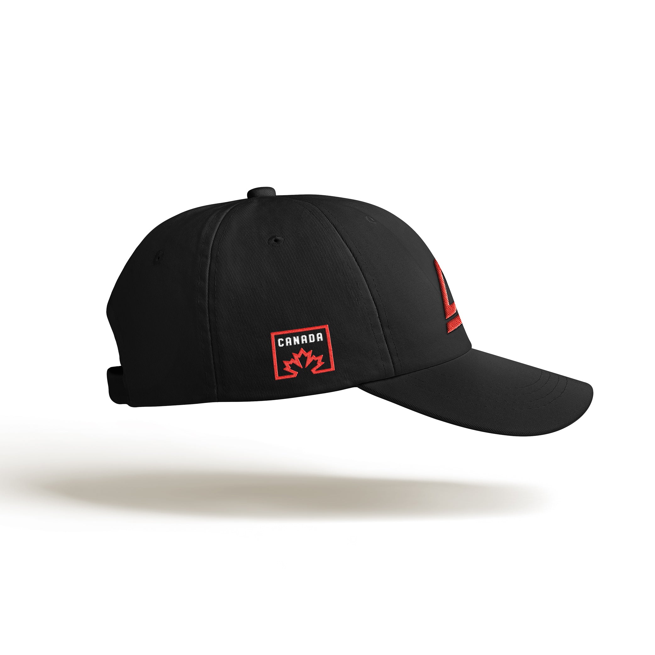 Right view of black Arcadion cap with a red rectangular Canada emblem with an outlined maple leaf.